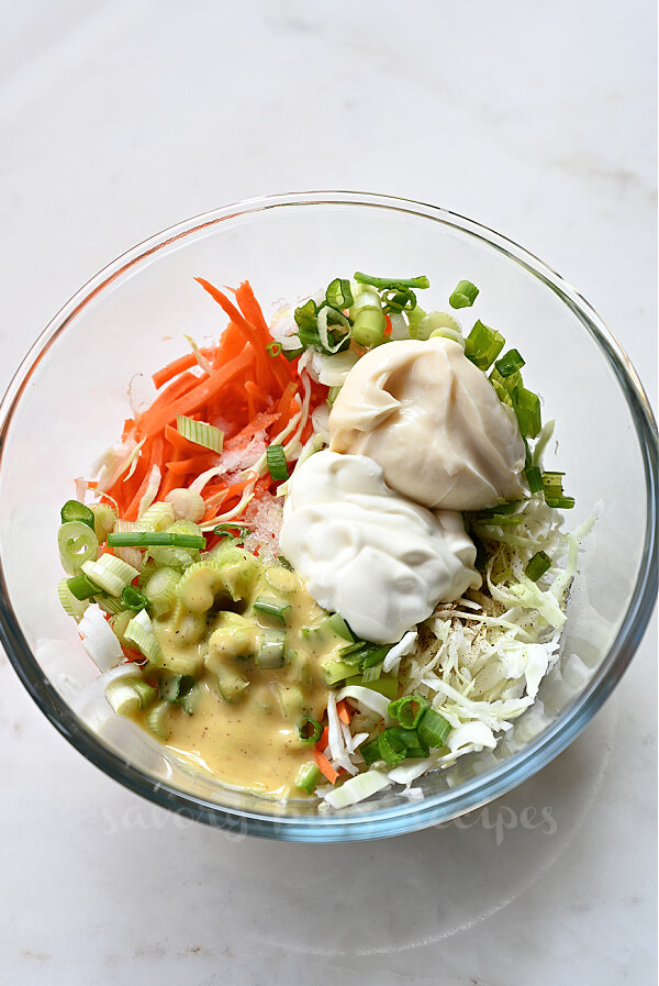 a bowl with ingredients to make cabbage slaw