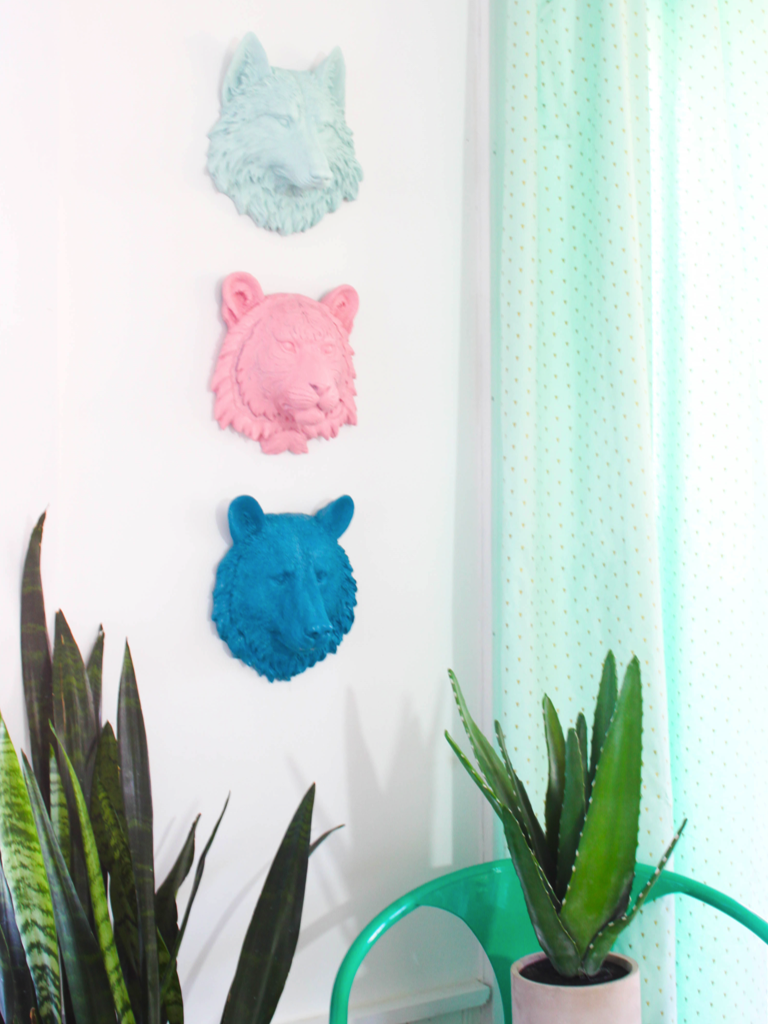I love these animal heads! What a fun way to add a bit of color and whimsy into a kids room! 