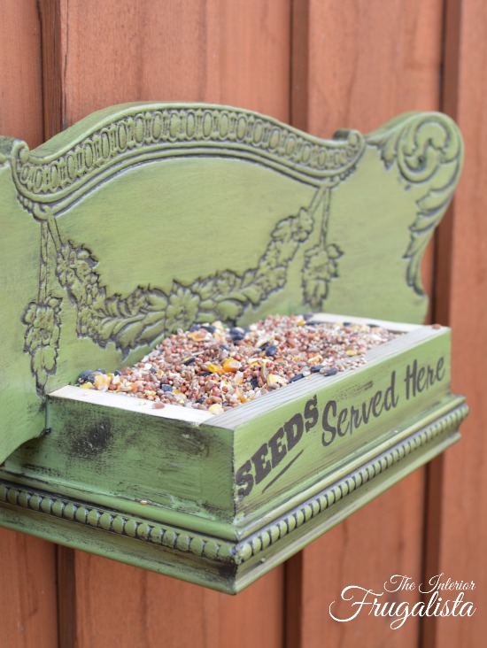 How to build a wooden DIY Bird Feeder from a repurposed antique press back chair with a step-by-step tutorial - a fun outdoor DIY project for Spring!