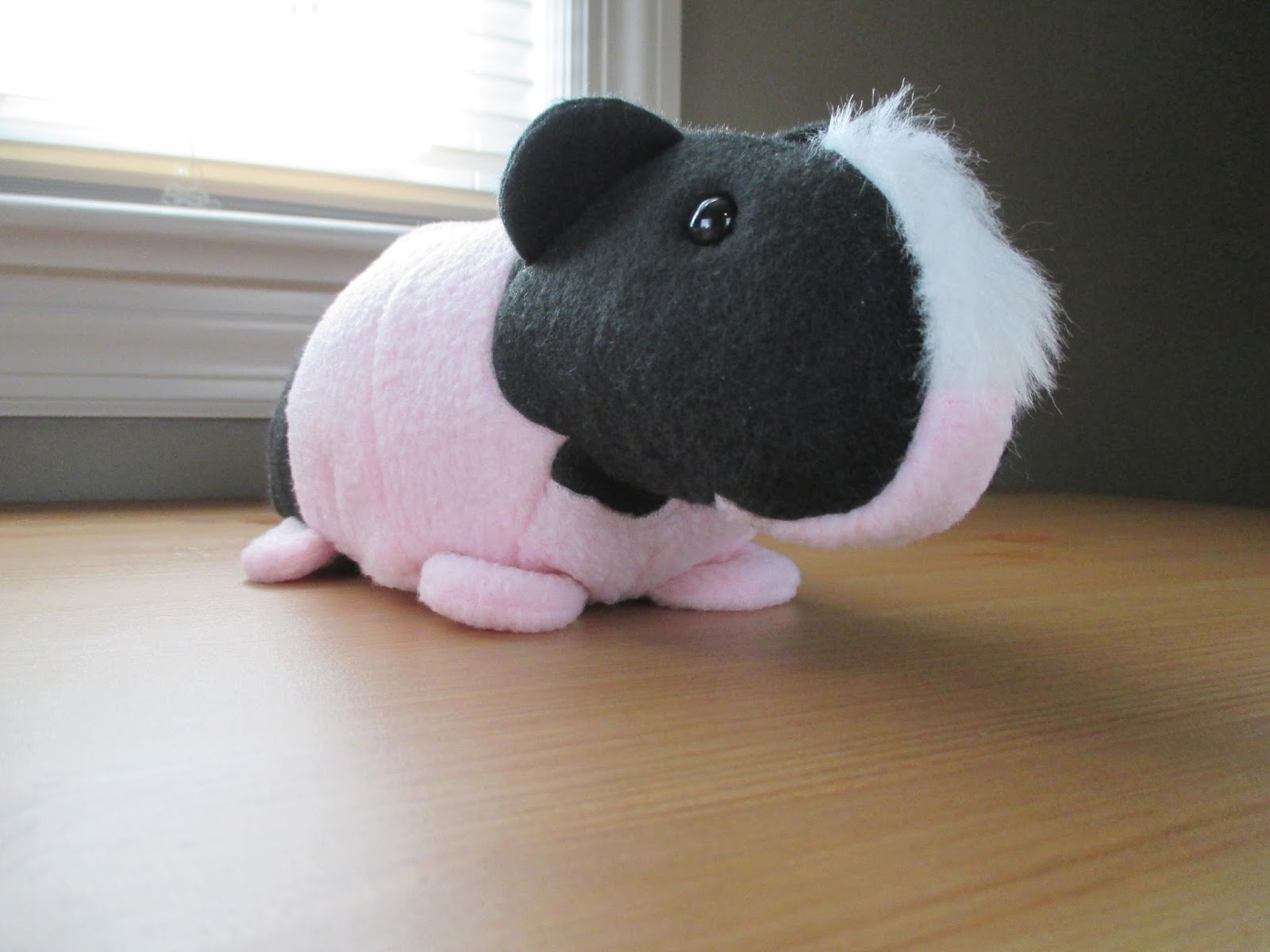 View of Fleece Menagerie: Skinny Guinea Pig, Black and Pink (SOLD)