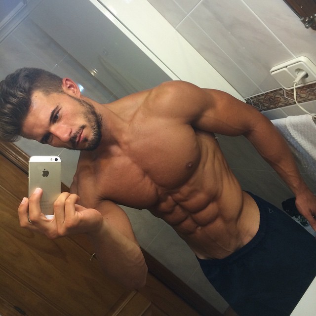 attractive-shirtless-fit-tanned-daddy-antonio-pozo-beard-abs-selfie