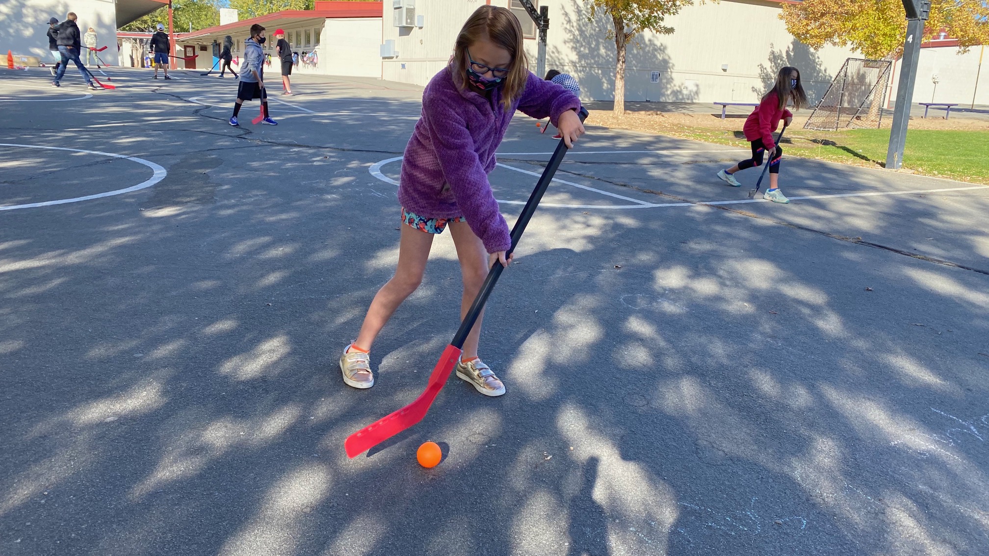 Dr. Brock's Class Learning the Skills of Hockey