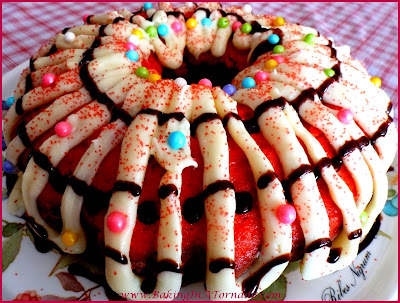 Peppermint Chocolate Chip Bundt Cake: Although this cake uses a bit of a cheat, it's a delicious cake bursting with peppermint flavor with a bit of chocolate in the background | Recipe developed by www.BakingInATornado.com | #recipe #cake.