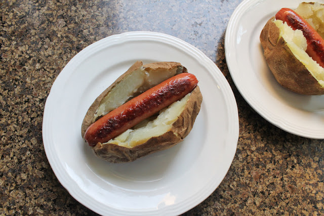 Food Lust People Love: Ban the bun and pass the potatoes! These chili cheese dog baked potatoes will be a favorite at your next family dinner or barbecue.