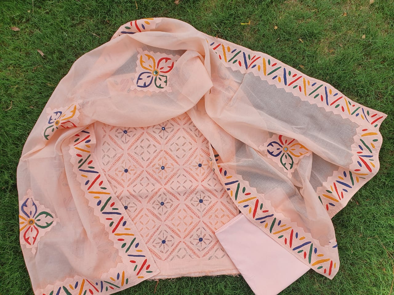 Applique dress materials with embroidery