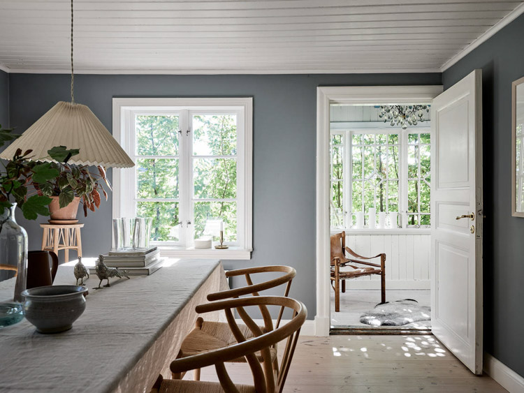 An Idyllic Blue and White Swedish Cottage In The Countryside