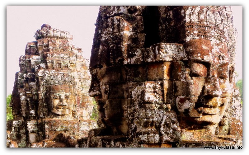 smiling faces at the Bayon smiling faces at the Bayon