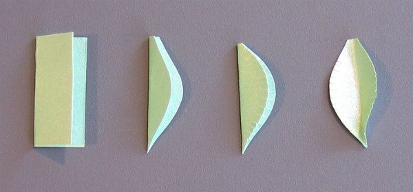 four steps to make a folded fringed paper leaf