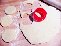 tattie scone dough rolled out and cut with a cookie cutter