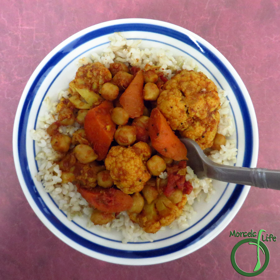 Morsels of Life - Cauliflower Carrot Curry - Cauliflower, cooked up with carrots, tomatoes, and chickpeas in a thick curry sauce containing garlic, ginger, and onion for one flavorful cauliflower carrot curry.