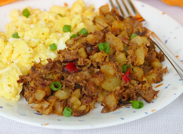 Use your leftover beef roast and potatoes in this delicious breakfast beef roast hash! Pure old school comfort food that's great with a fried egg on top, scrambled eggs on the side, cheddar cheese or sliced green onions on top!