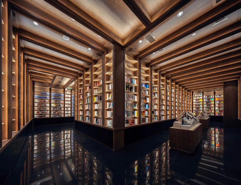 Mirrored ceilings have transformed a Chinese bookstore into fairy mazes