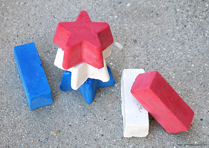 Sidewalk chalk in red, white and blue.
