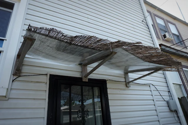 pathetic lame attempt at a back door awning DIY