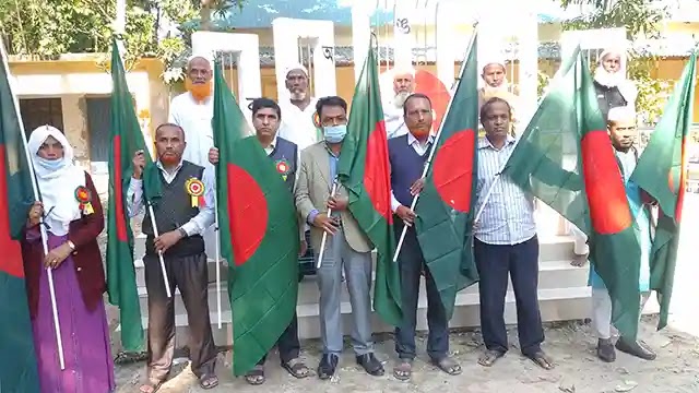 Reception of freedom fighters and distribution of national flag in the month of victory