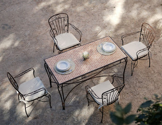 Mesa ceramica y 4 sillas jardin forja