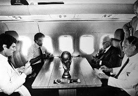 Pertini was pictured playing cards with Dino Zoff, Franco  Causio, and Enzo Bearzot on the plane home from Spain