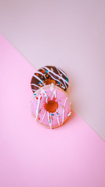 Donuts, dessert, sweets, pink background Donuts, dessert, sweets, pink background