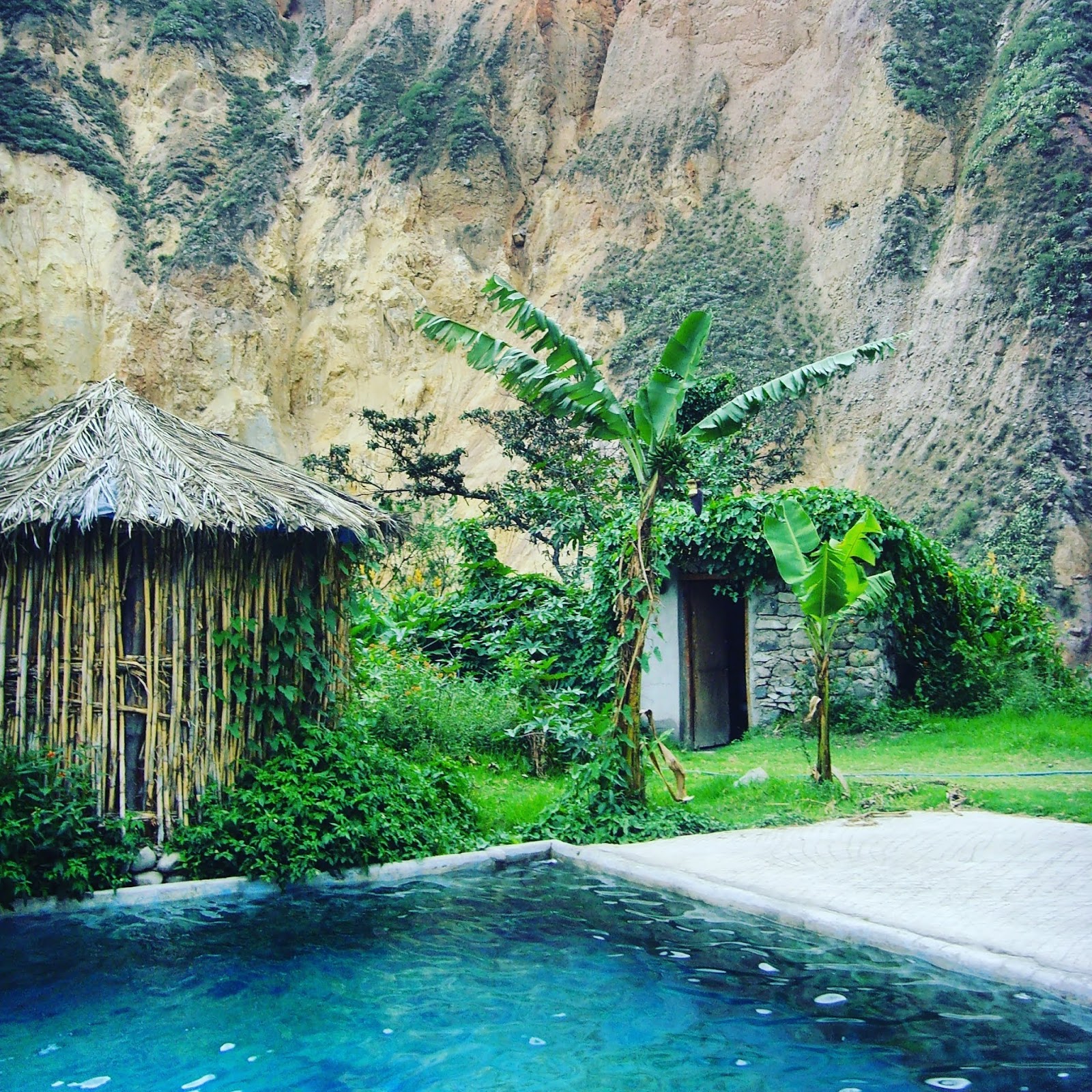 pool next to bamboo hut in sangalle colca canyon peru