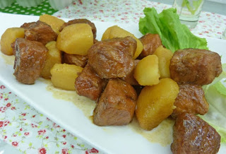 Lombo de porco de panela com batatas
