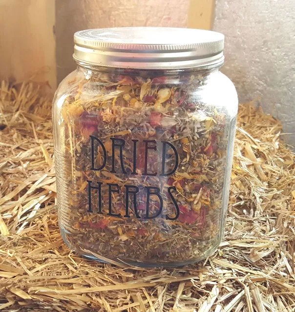 glass jar of dried herbs