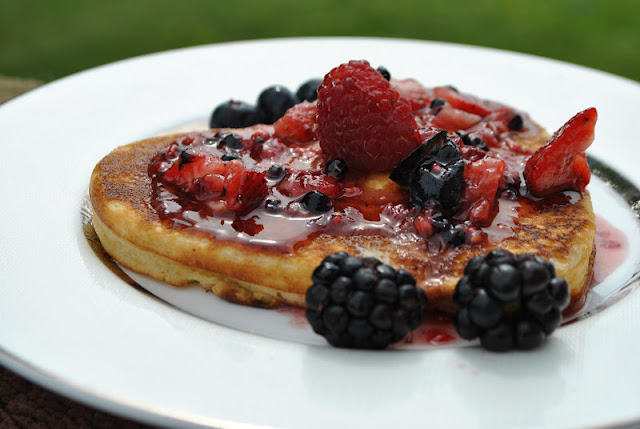 Pancake with berries and maple syrop