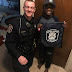 Michigan police officers surprise a bullied nine-year-old boy with cake, gifts and even a singing quartet after NONE of his classmates showed up to his birthday party
