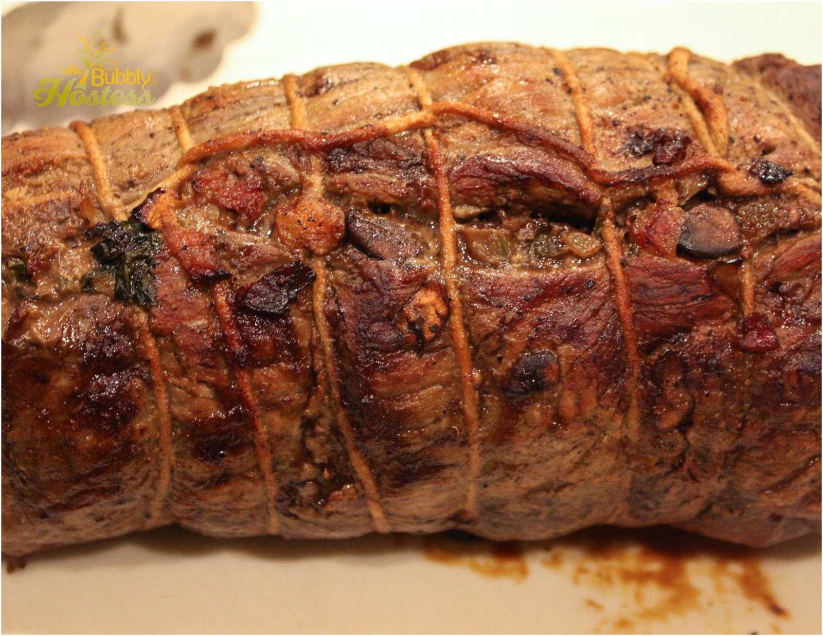 The Bubbly Hostess Lobster Stuffed Beef Tenderloin with Béarnaise