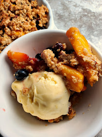 Peach Blueberry & Ginger Crisp:  Nothing tastes more like summer than juicy sweet peaches with bursts of tart blueberries laced with ginger, all topped with a crunchy buttery topping. - Slice of Southern