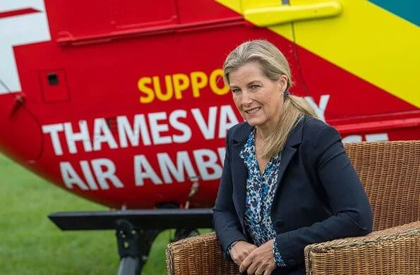 Dressed in a smart-casual ensemble of a blazer, a printed blouse and jeans. Sophie visited her patronage Thames Valley Air Ambulance