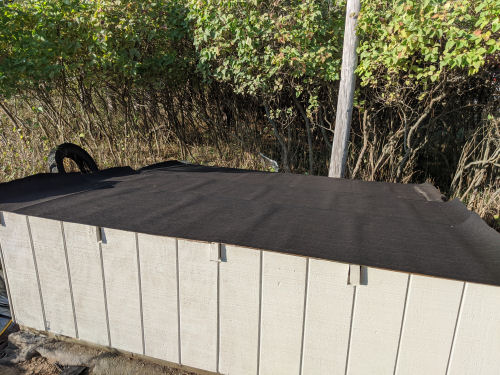 tarpaper on a shed roof