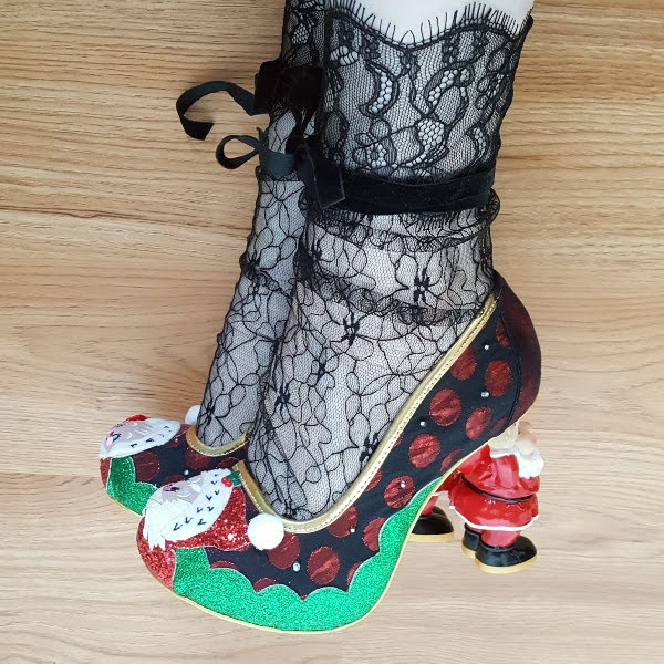 wearing Santa heeled shoes with black lace socks
