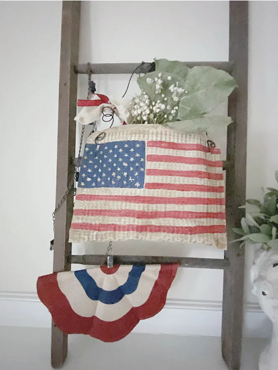 Mini mantel ladder with American flag pouch and a bunting