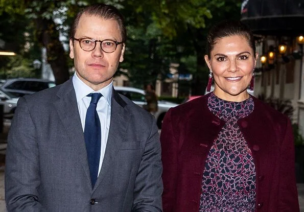 Princess Victoria wore a printed midi dress from By Malina. Rizzo Azelia suede pumps and Saturn earrings. By Malina Lysandra dress