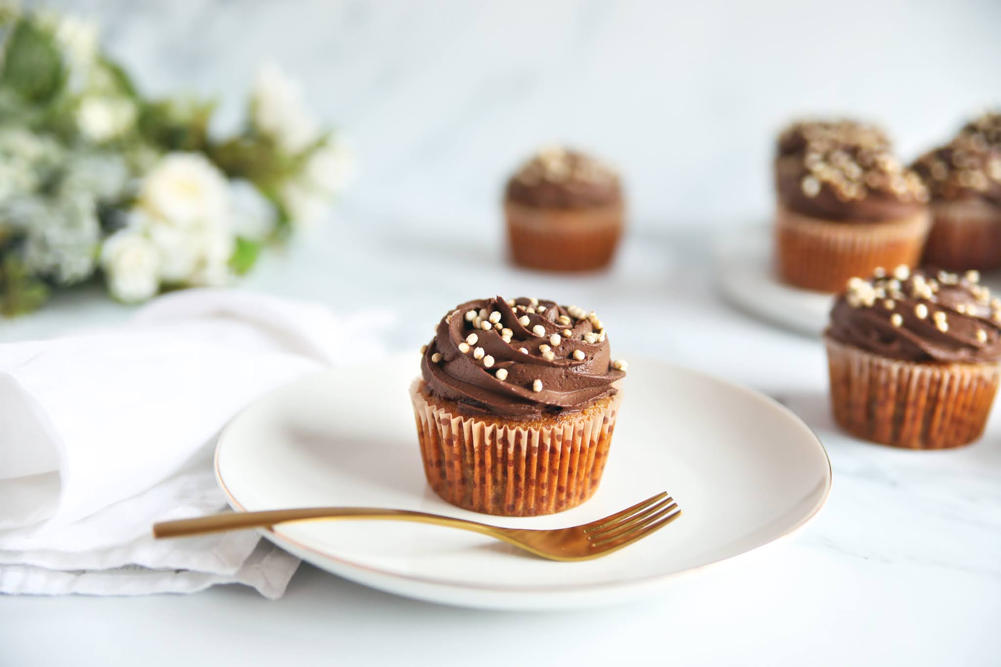 Vegan vanilla cupcakes with dark chocolate buttercream frosting