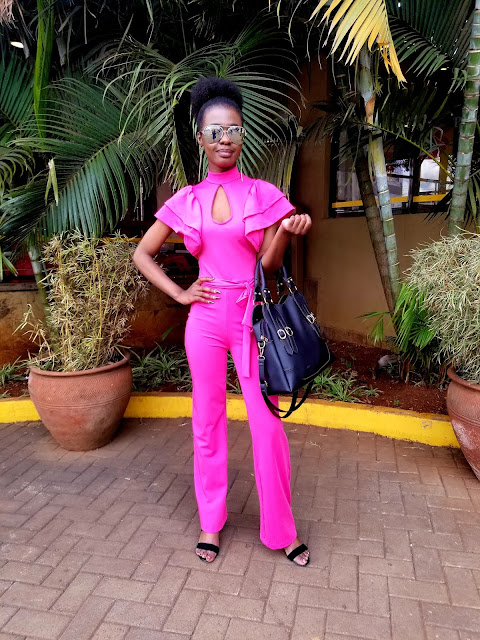 How To Pull Of A Jumpsuit That's Bright Pink