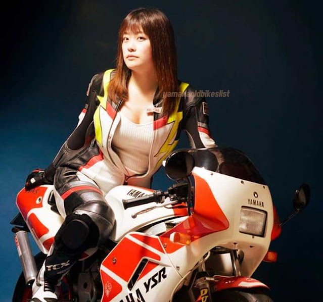 Cute Asian Girl with Yamaha Bike