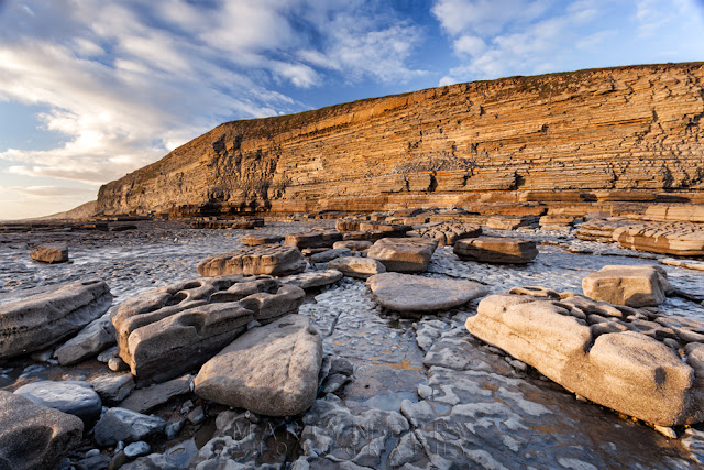 Dunraven Bay cliffs in the warm evening sunlight in the South Wales coast by Martyn Ferry Photography