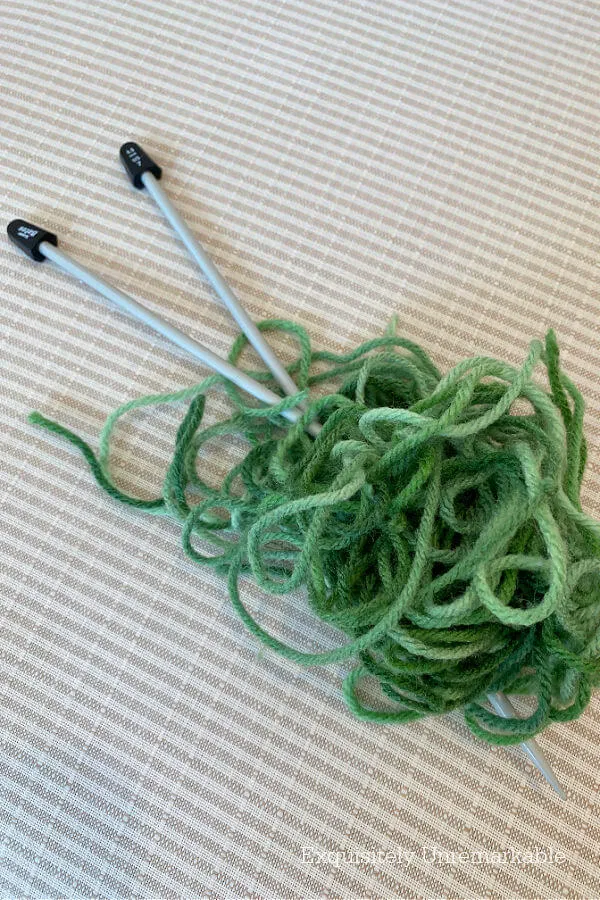 Green Variegated Yarn On Needles