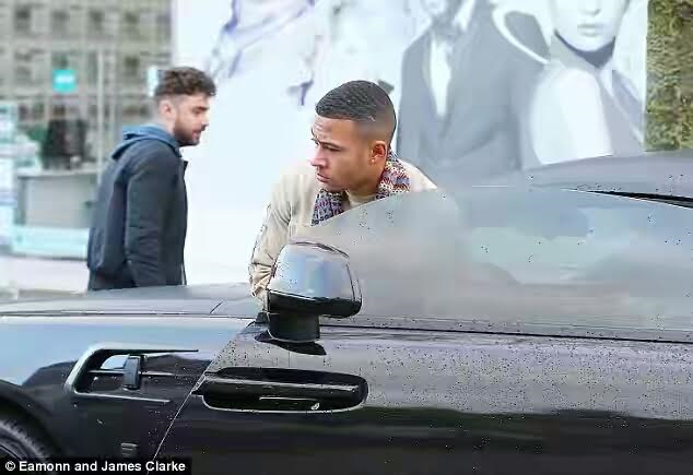 Manchester United star Memphis Depay pictured with his ?250K Rolls Royce