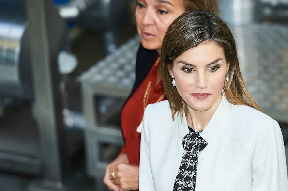 Queen Letizia of Spain visited the Research Institute of Food Science (CIAL) wore Carolina Herrera blouse, magrit shoes