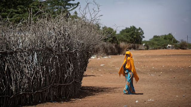 A 17-year-old girl walking in Kenya photo