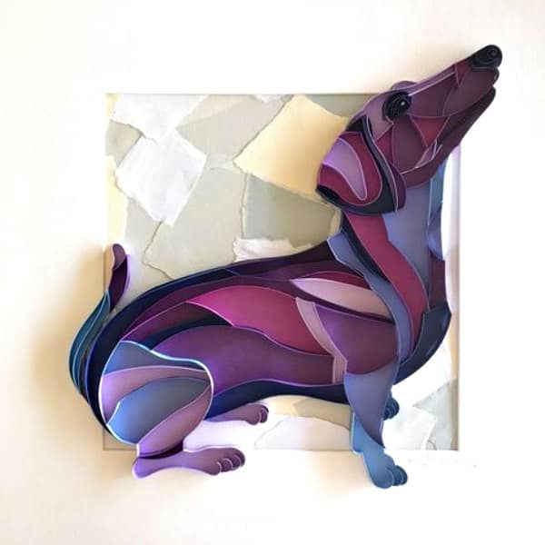 on-edge quilled dachshund with torn paper background in shades of purple