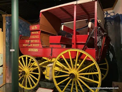 red mail wagon display in Placer Country Museum in Auburn, California