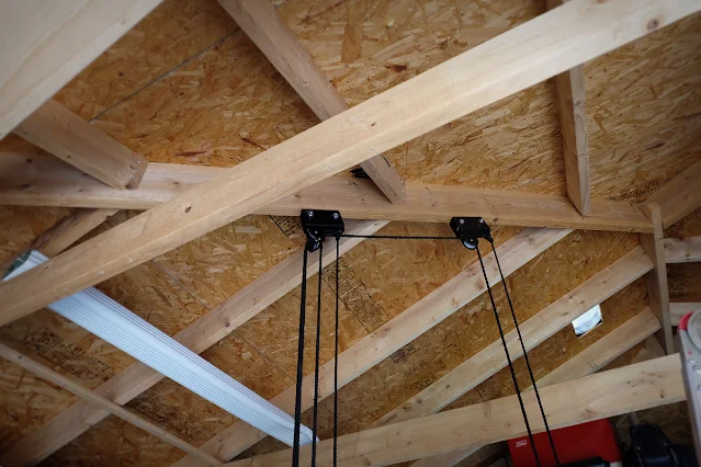 moving kayak hoist brackets to a higher rafter