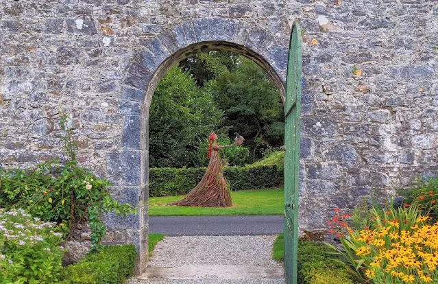 Dingle to Dublin Drive: stick sculpture of a woman at Adare Manor