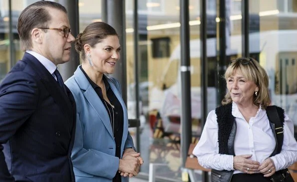 Crown Princess Victoria wore a narina blazer by Tiger of Sweden, summer feather earrings by Kreuger Jewellery,  levy ankle boots by Gianvito Rossi