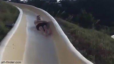 Guy-falls-out-of-waterslide.gif