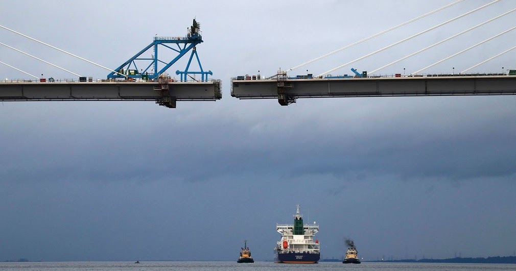 A tanker carrying US shale gas passes under the Queensferry Crossing