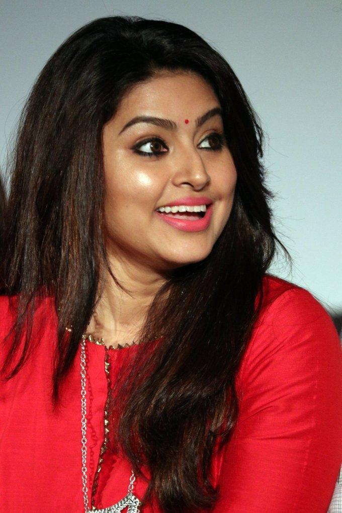 Actress Sneha Smiling Face Close Up In Red Dress